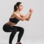 Woman with hypothyroidism doing squats